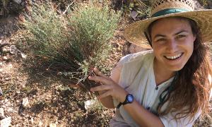 Maya holding resprouted plants